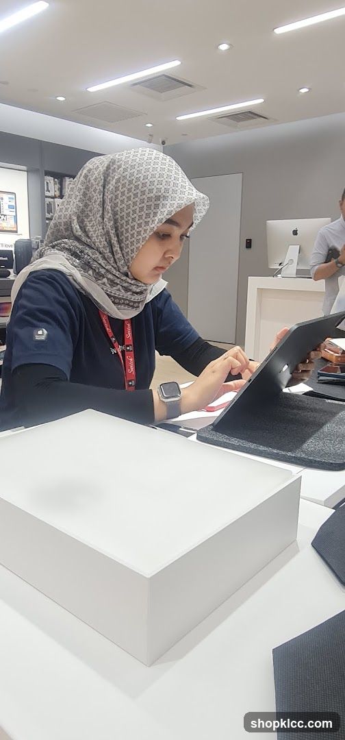 Employee using a tablet in a store