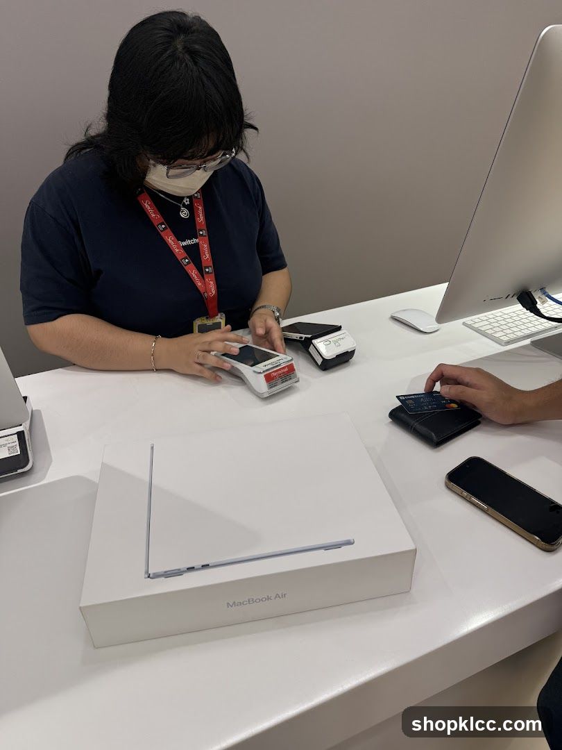 Customer making a payment at a retail counter