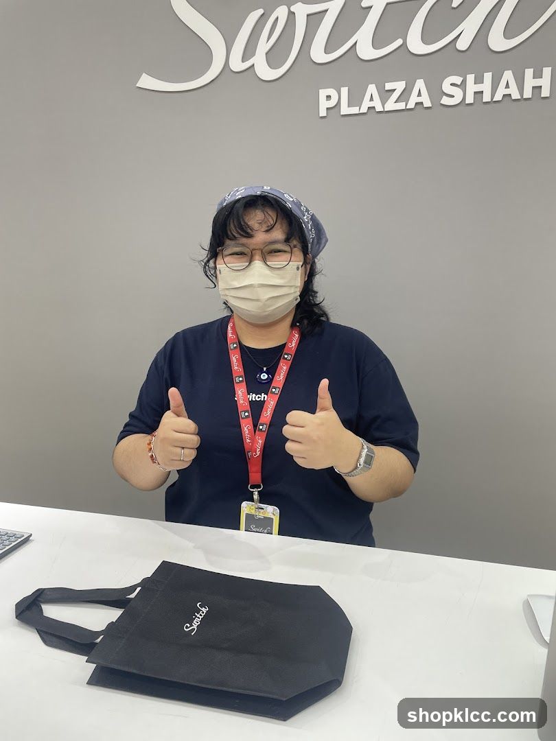 Employee giving thumbs up