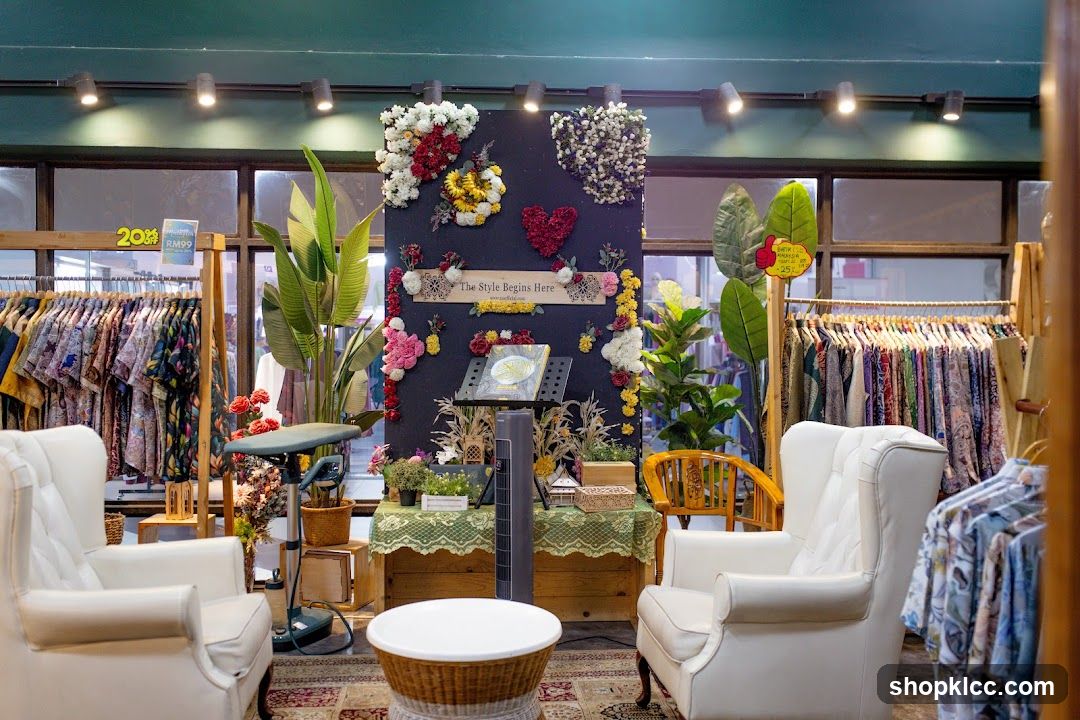 Clothing store interior with seating and floral decorations
