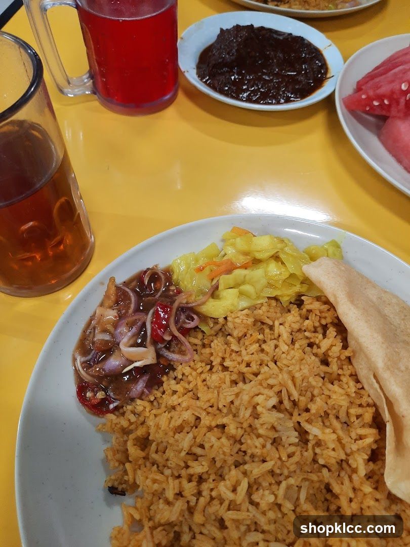 Rice dish with side dishes and drinks