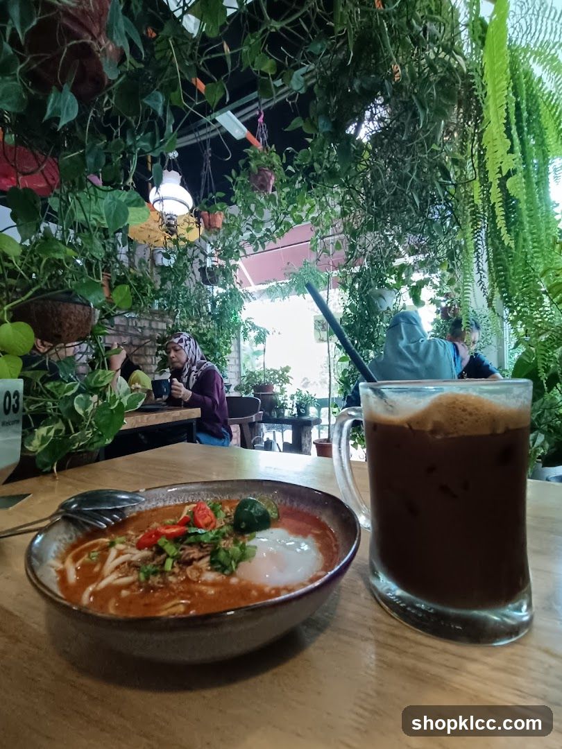 Cozy cafe interior with lush greenery and food