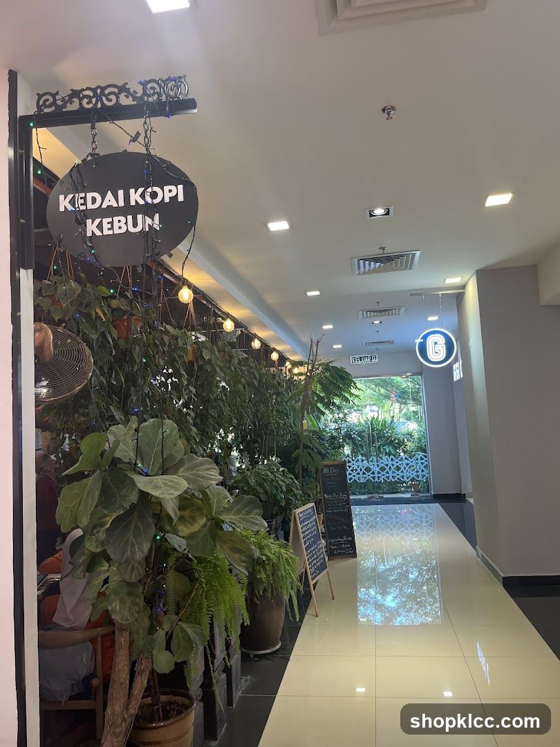 Coffee shop interior with plants and signage