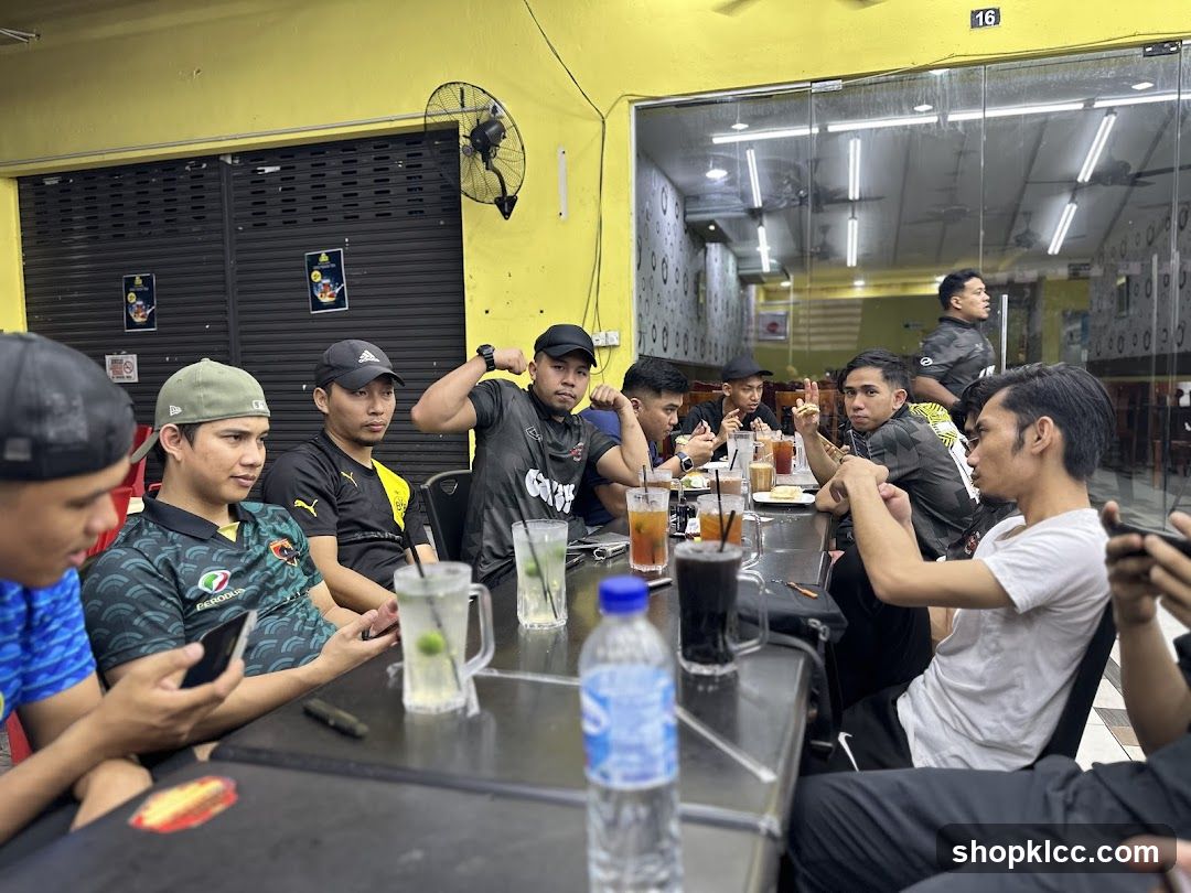 Group of men eating at a restaurant