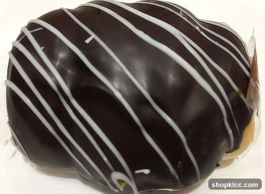 Chocolate Donut with White Drizzle