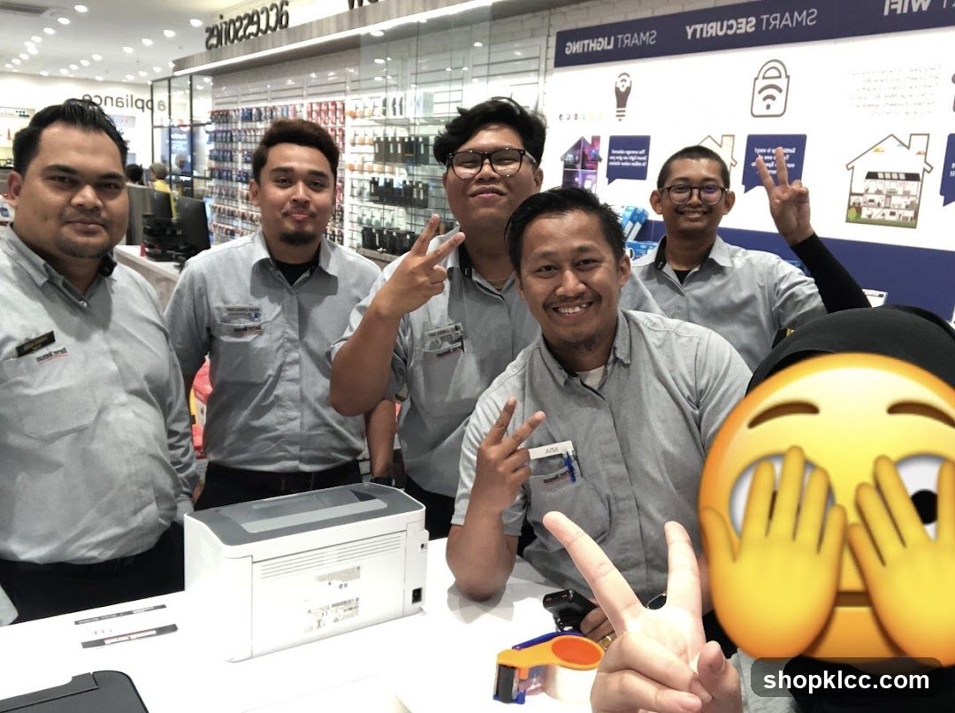 Store Employees Posing for a Photo