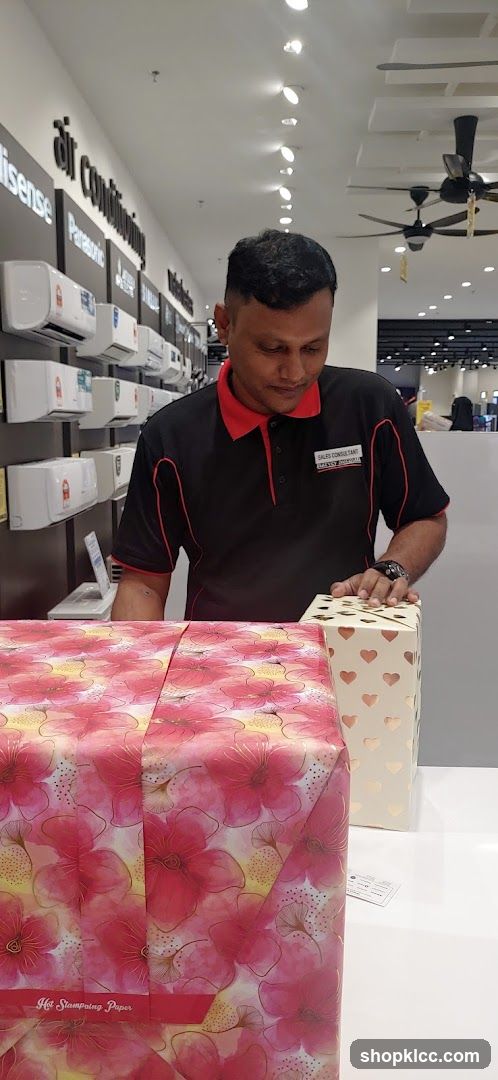 Sales Consultant with Gift-Wrapped Items