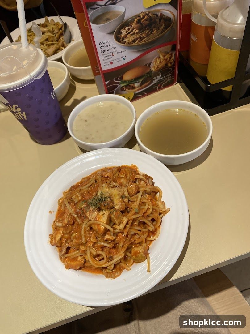 Spaghetti Meal with Soup and Drink