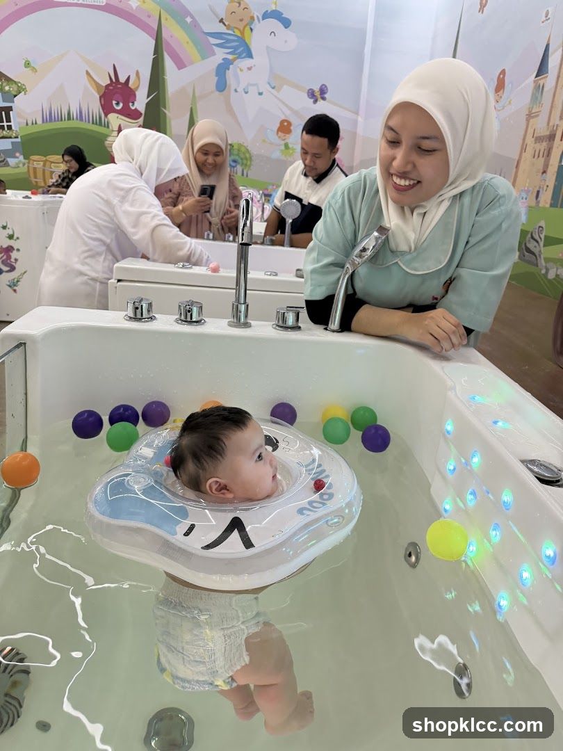 Baby enjoying a bath with a neck float