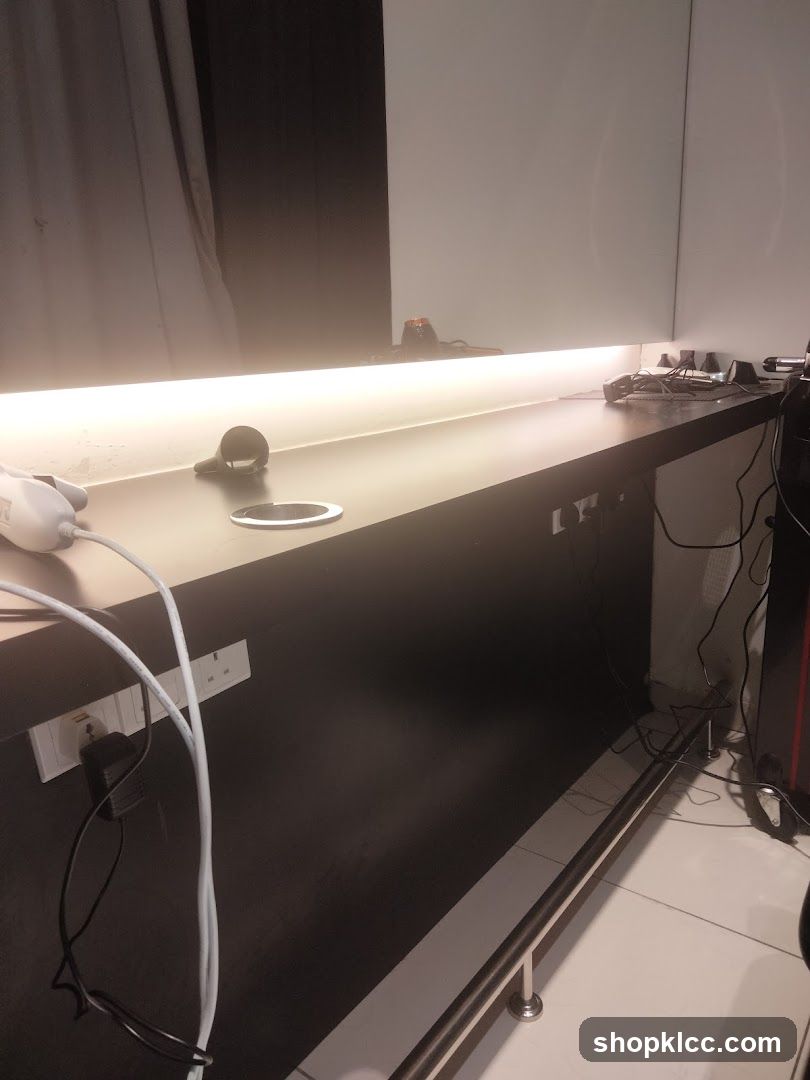 Countertop with electrical outlets and cables