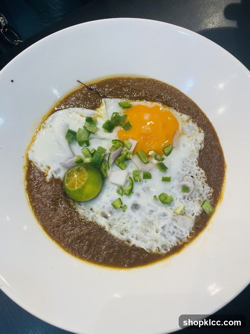Fried Egg with Gravy and Garnish