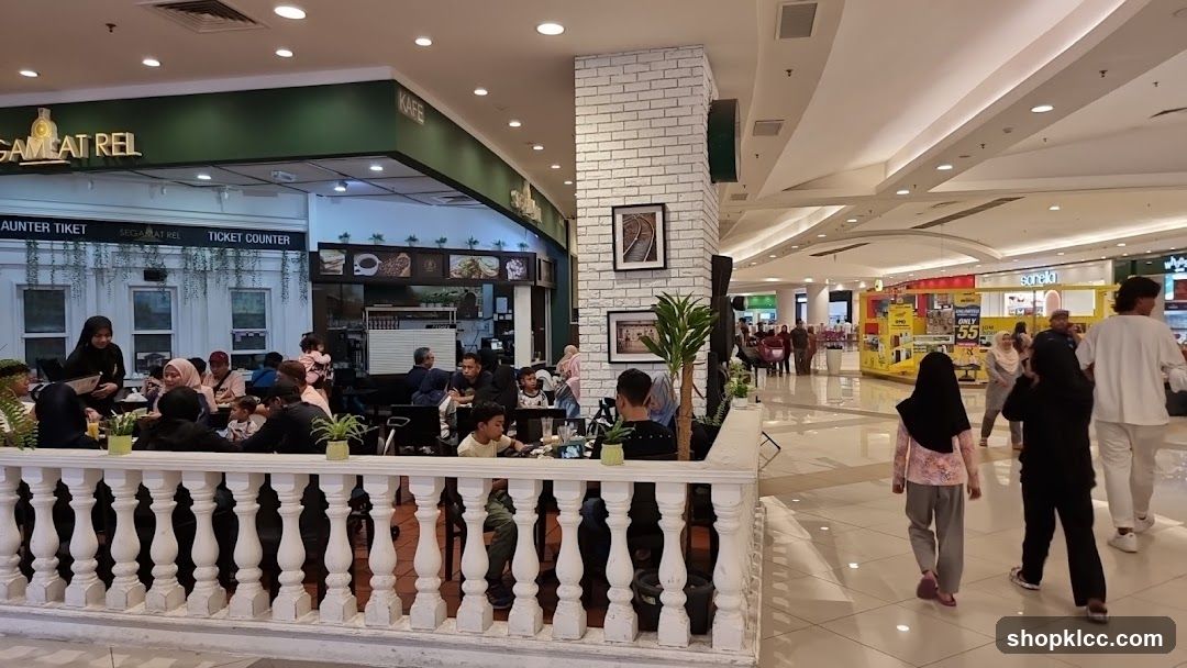 People dining at a cafe in a mall