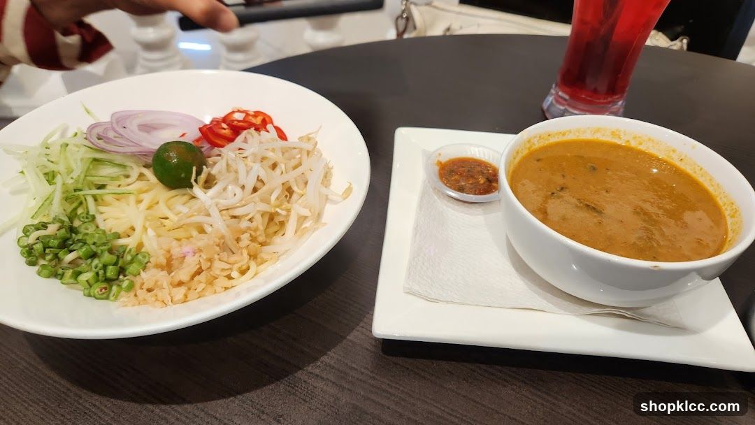 Noodle Dish with Soup and Condiments