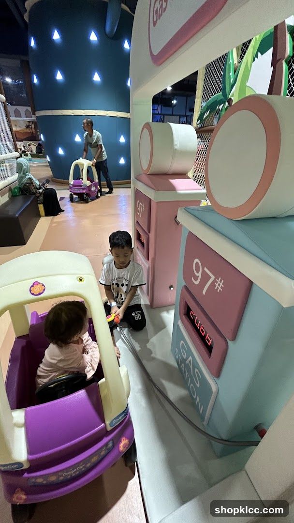 Children Playing at a Gas Station Themed Play Area