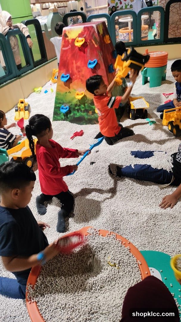 Children playing in a ball pit