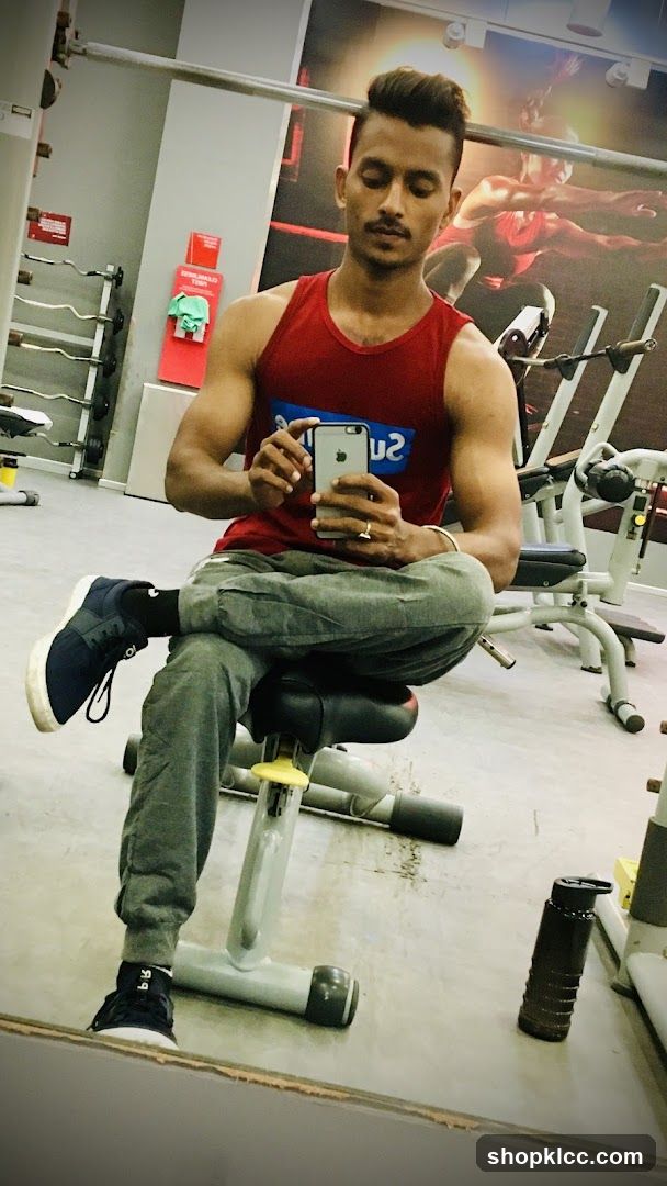 Man taking a selfie in a gym