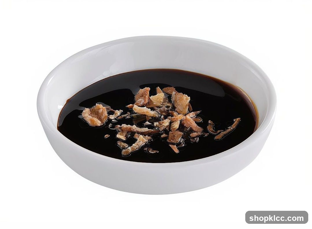Bowl of Dark Sauce with Toppings