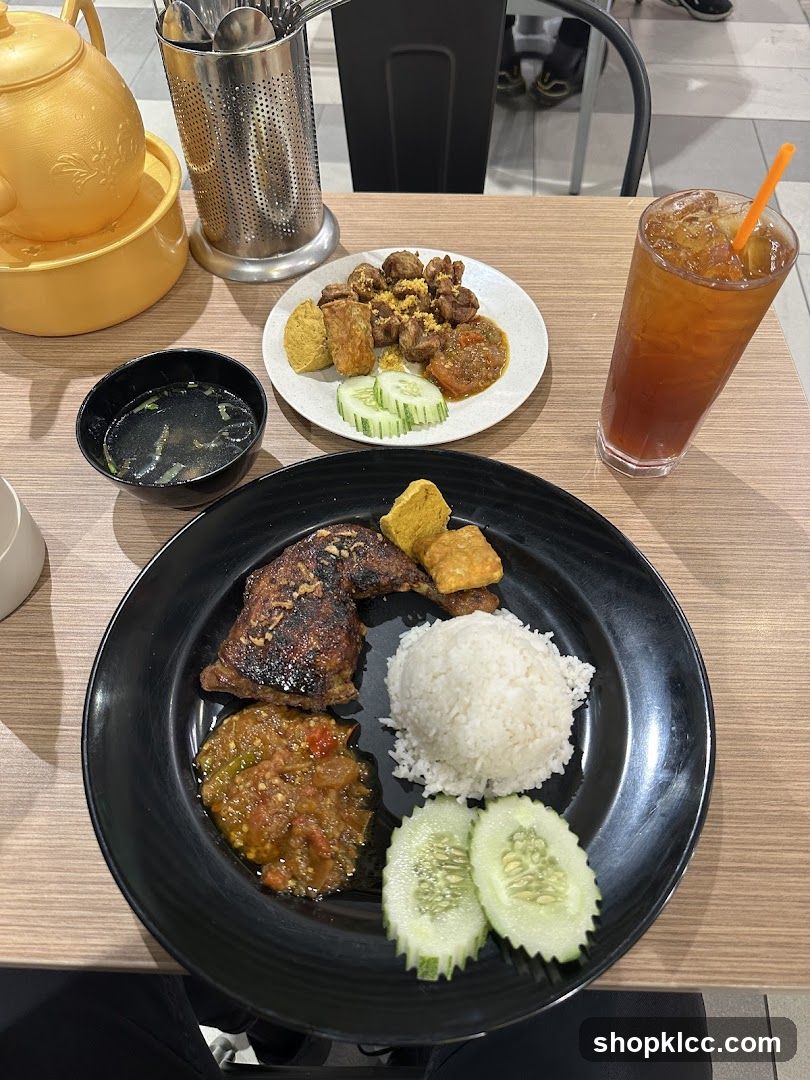 Meal with Grilled Chicken and Side Dishes