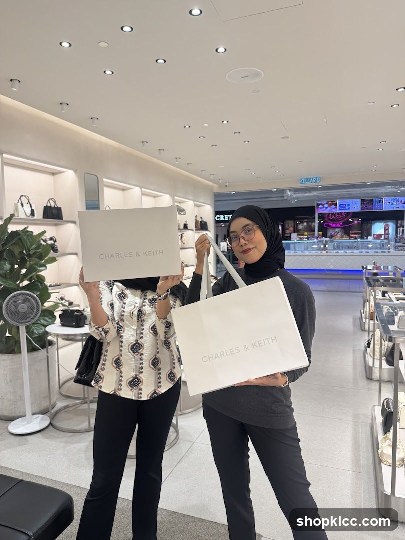 Two women holding shopping bags