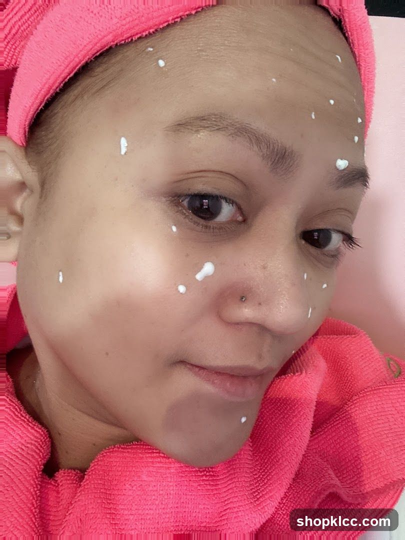 Woman with cream dots on face