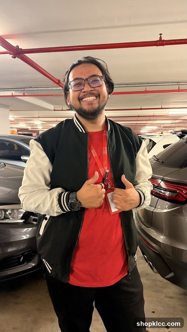 Man in bomber jacket giving thumbs up
