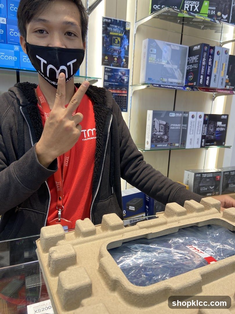 Man in TMT Mask and Red Shirt