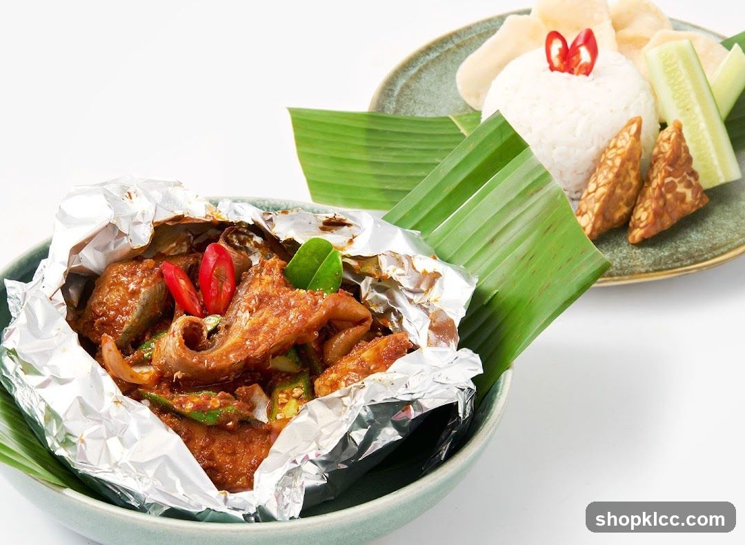 Foil-wrapped dish with rice and tempeh