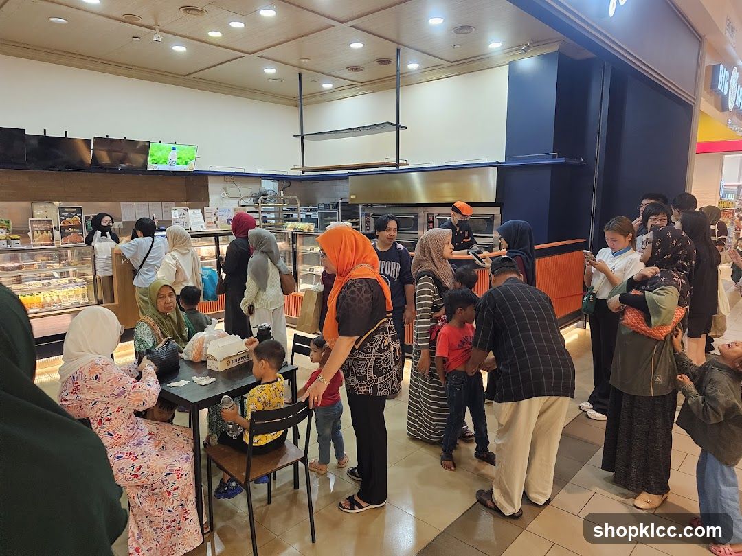People queuing at a bakery