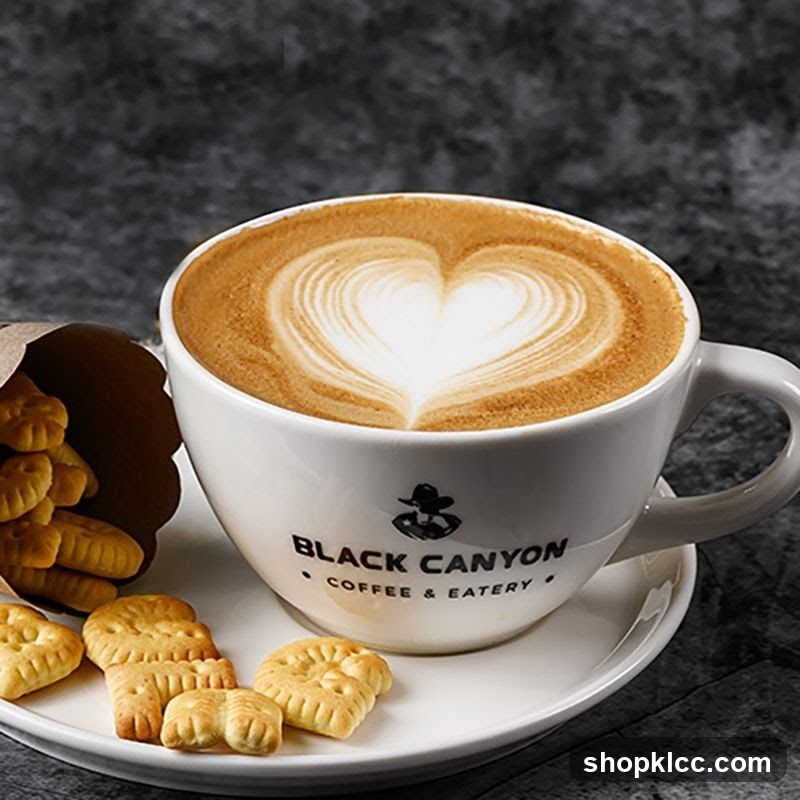 Latte with Heart Art and Biscuits