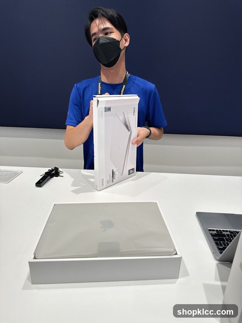 Salesperson with Laptop Packaging