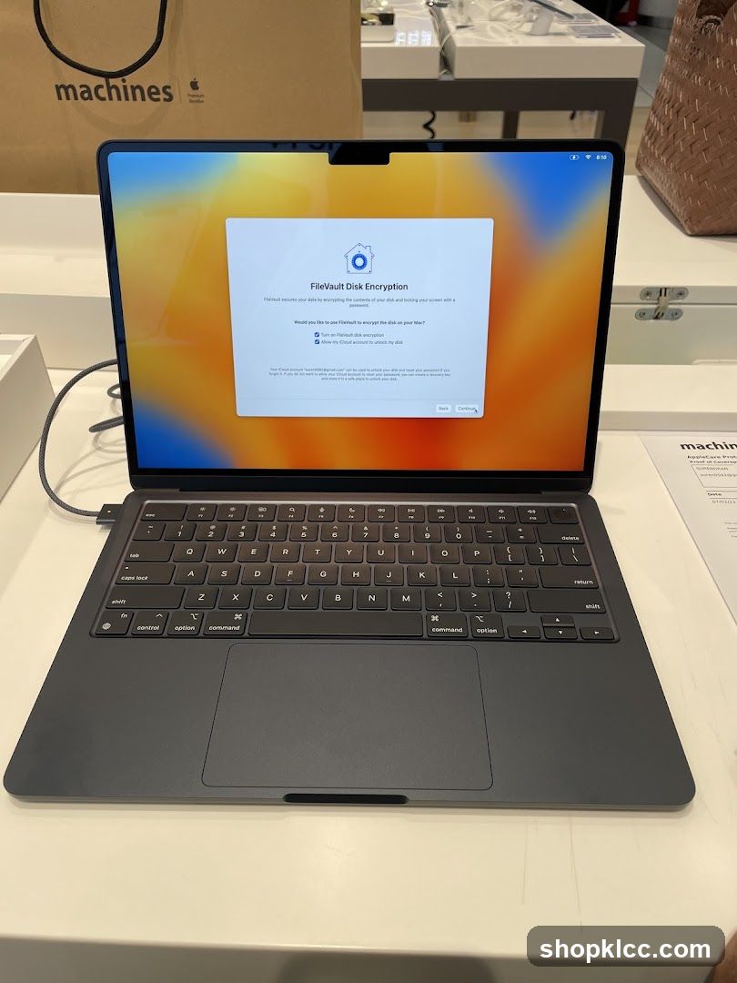 MacBook with FileVault Encryption Prompt