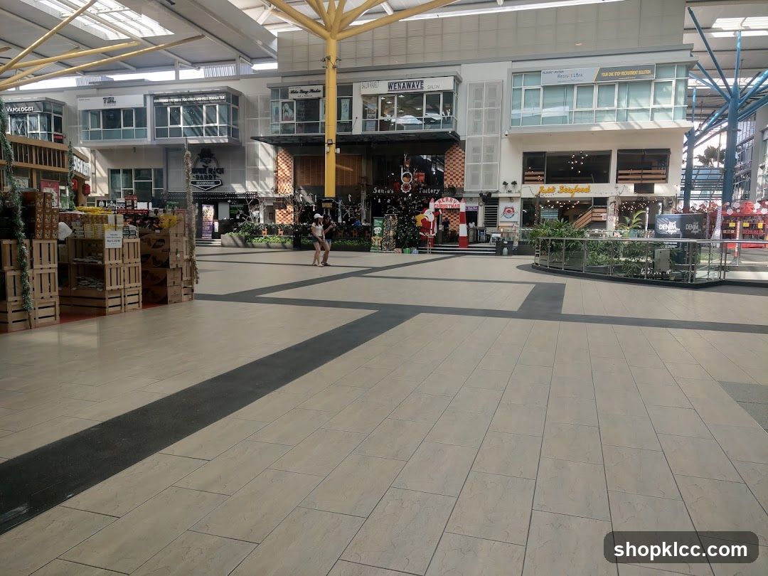 Outdoor shopping mall with various storefronts and displays