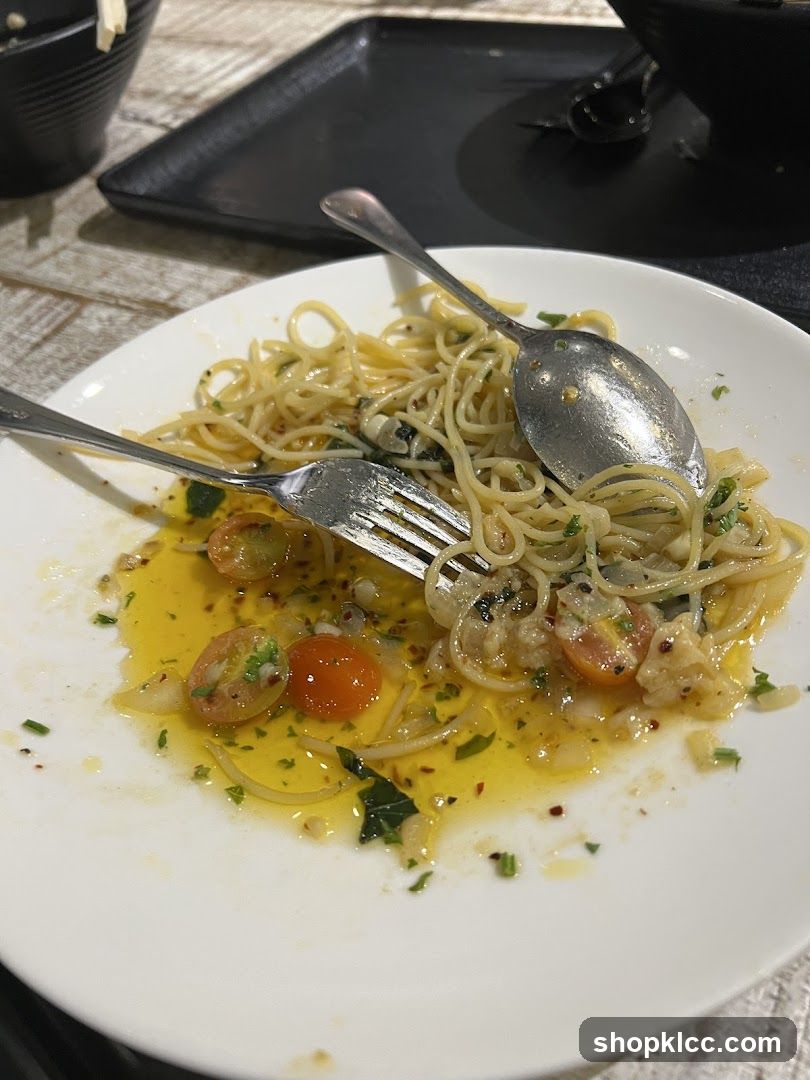 Partially Eaten Pasta Dish