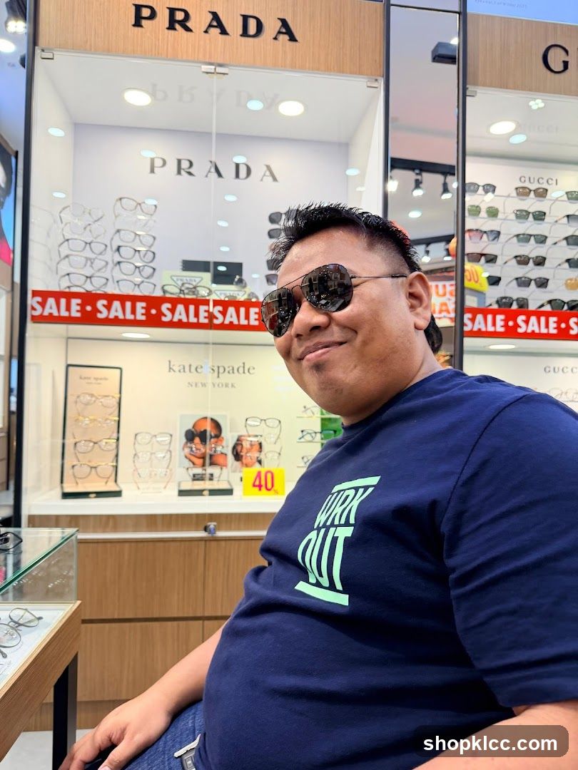 Man Posing in Eyewear Store