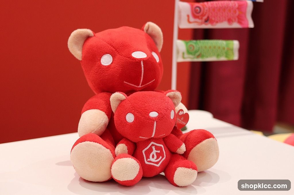 Two red teddy bears