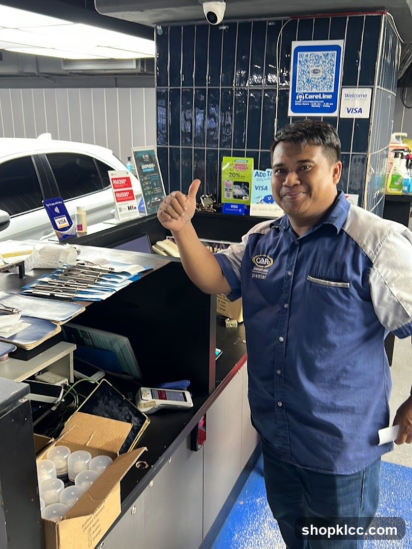 Man giving thumbs up at counter