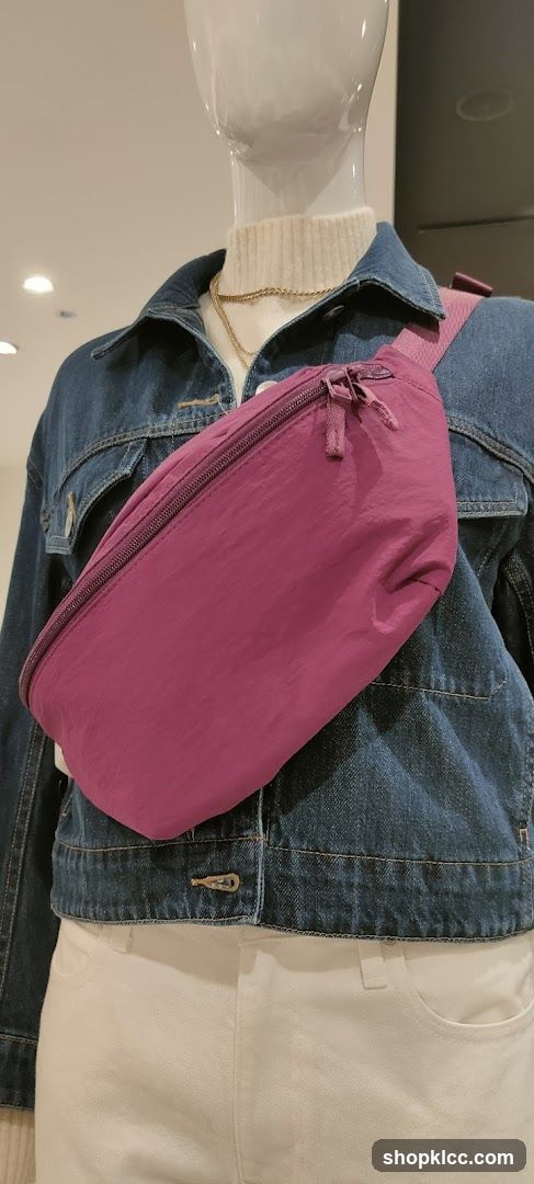 Mannequin wearing denim jacket and fanny pack
