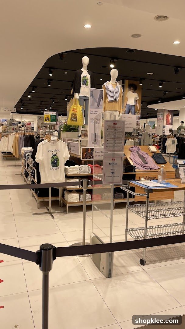 Clothing store interior with mannequins and displays