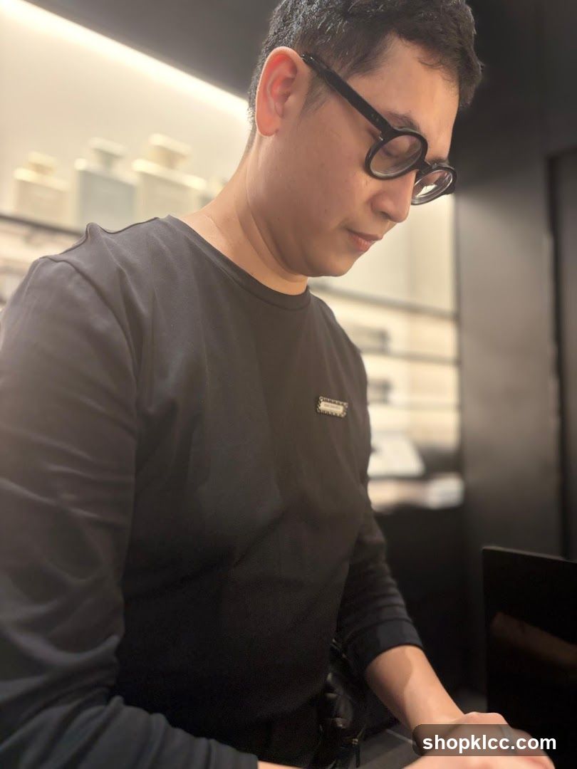 Man wearing glasses and a black shirt