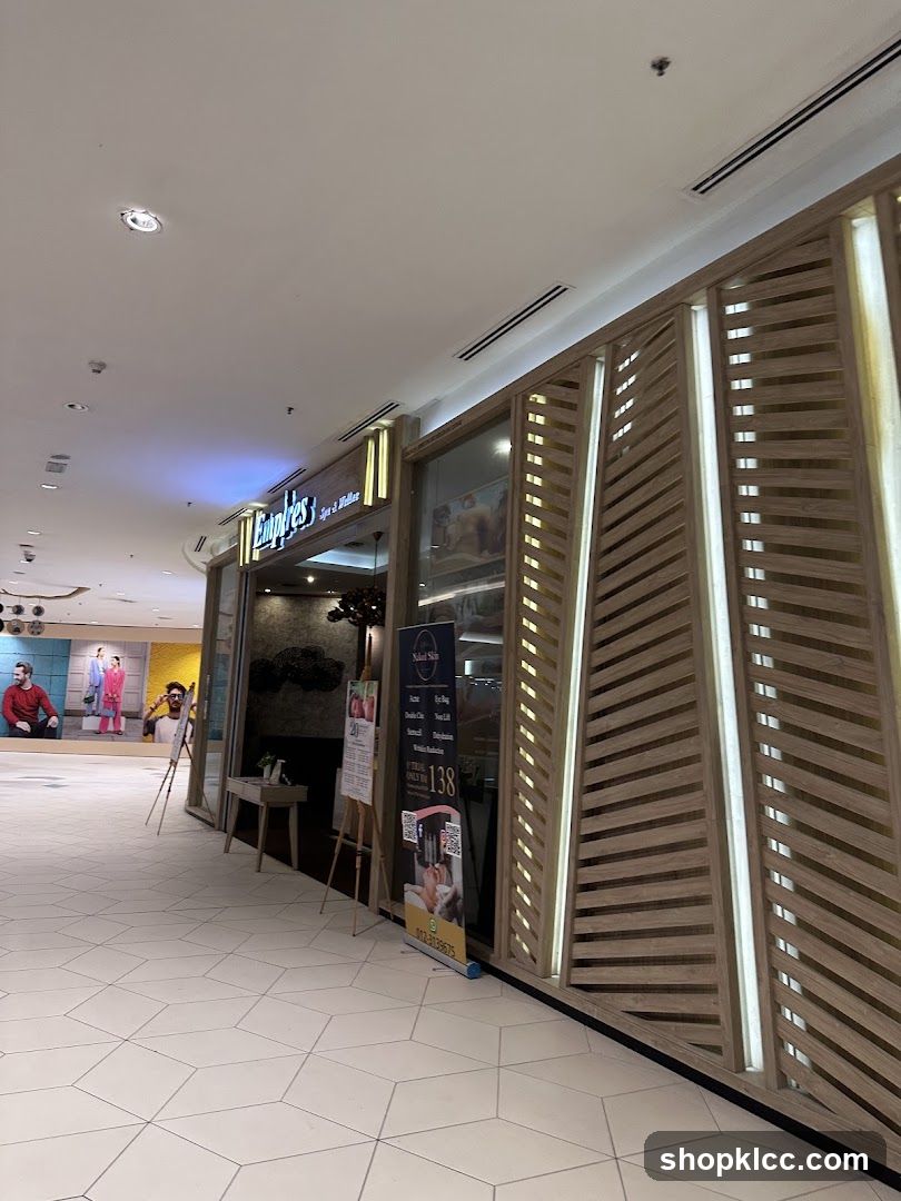 Shopping Mall Interior with Storefronts and Displays