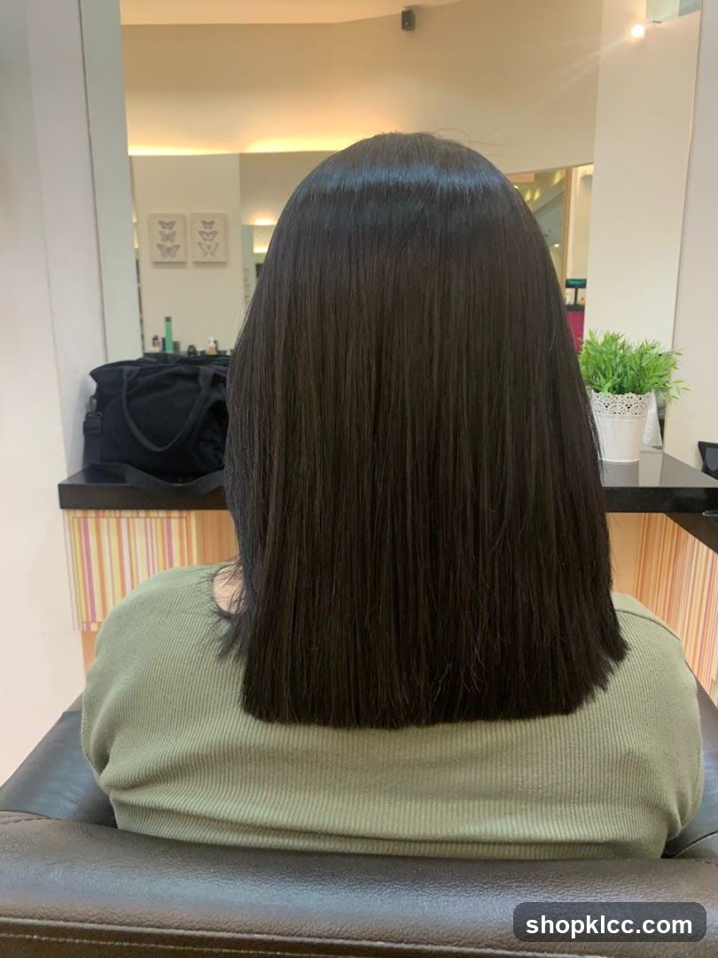 Woman with freshly cut dark hair