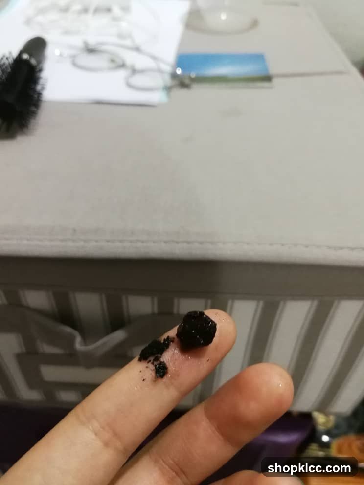 Finger with dark particles