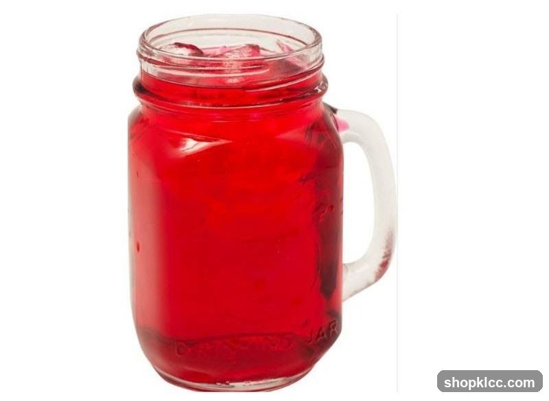 Red Drink in a Mason Jar