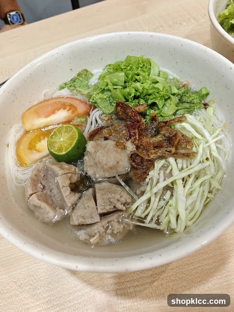 Bowl of Noodle Soup with Meatballs