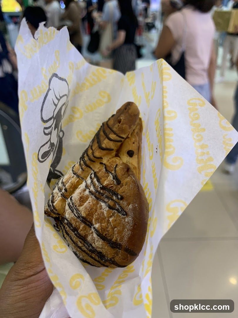 Pastry in branded wrapper