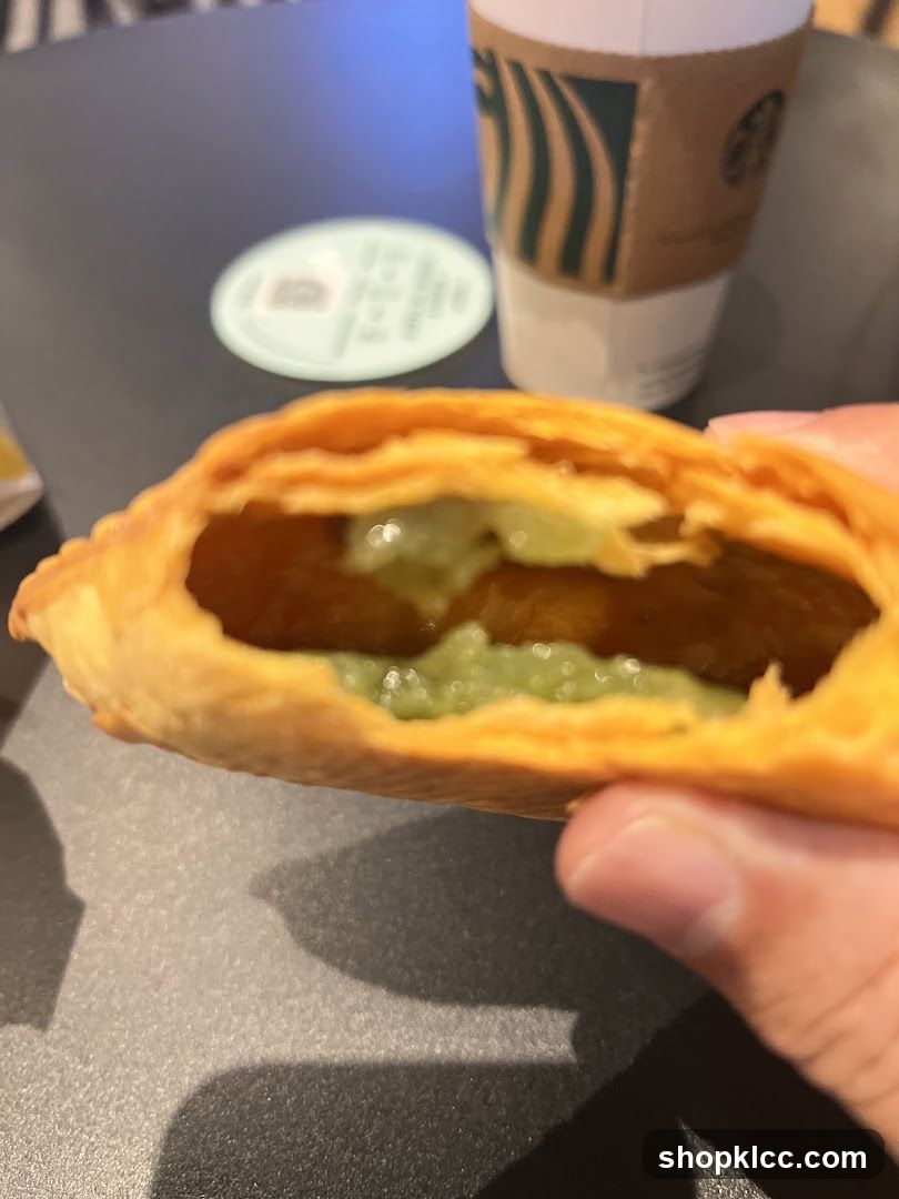 Pastry with Green Filling and Coffee Cup