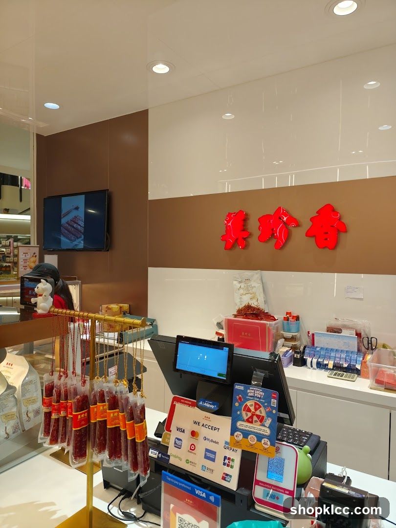 Store Counter with Packaged Meats and Payment Terminals