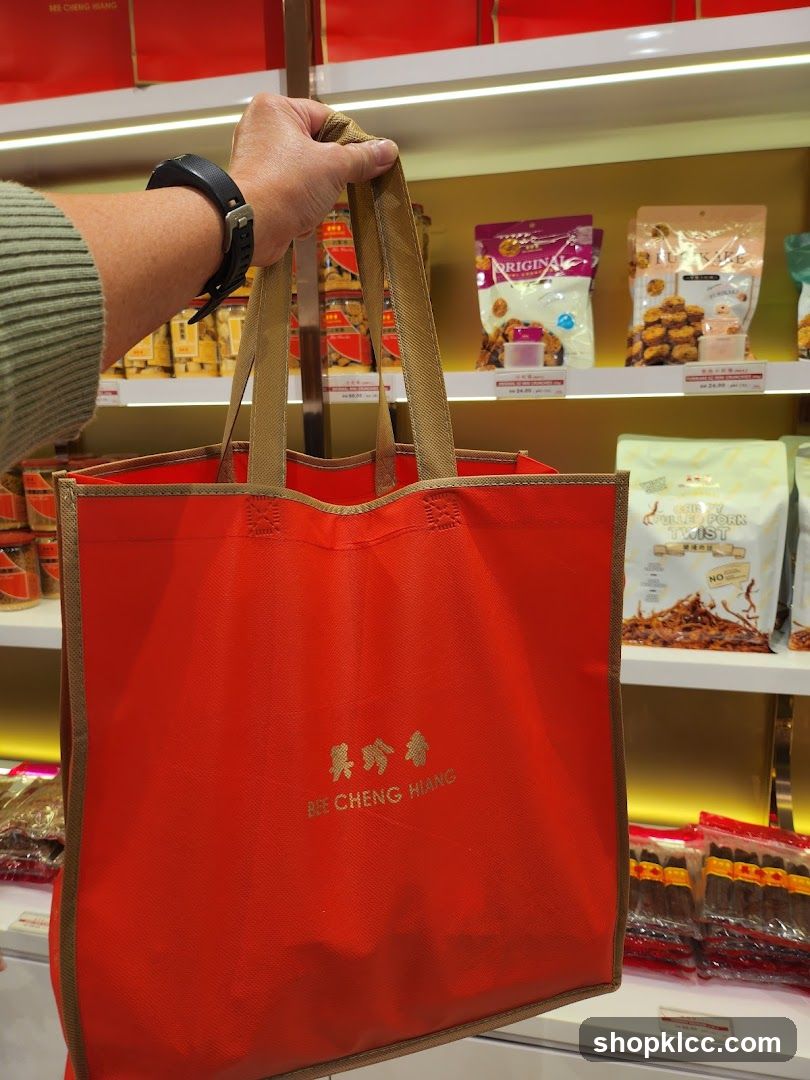 Red Shopping Bag with Bee Cheng Hiang Logo