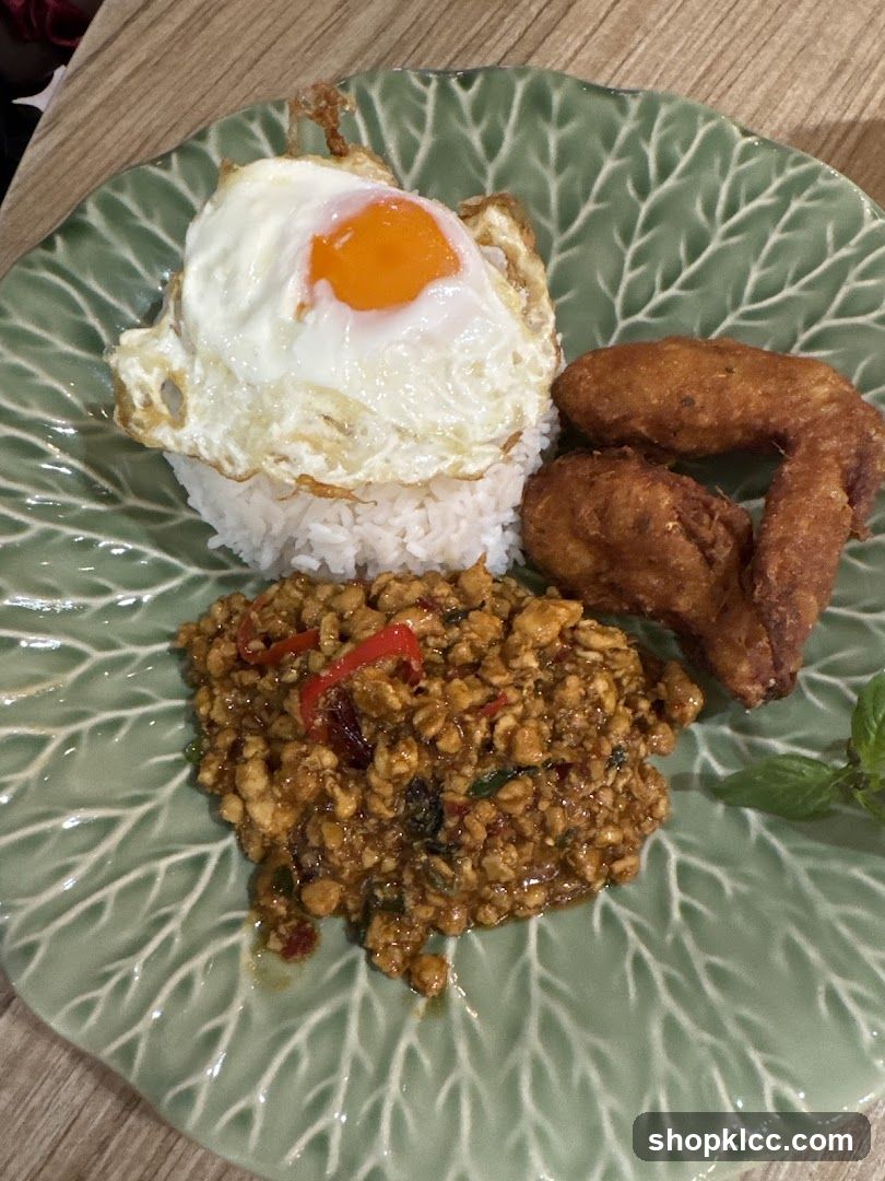 Thai Basil Chicken with Fried Egg and Wings