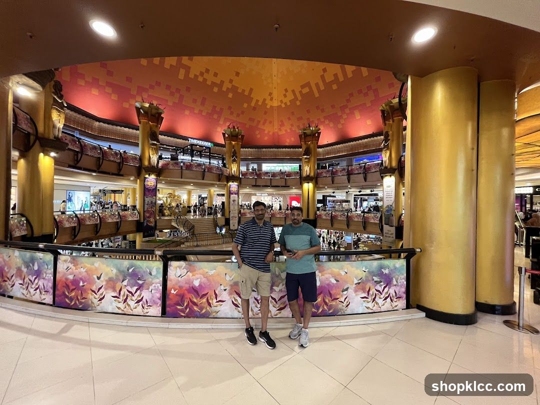 Two men posing in a shopping mall